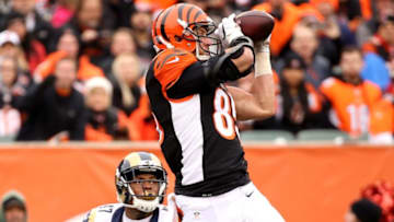CINCINNATI, OH - NOVEMBER 29: Tyler Eifert #85 of the Cincinnati Bengals makes a catch in front of Marcus Roberson #47 of the St. Louis Rams at Paul Brown Stadium on November 29, 2015 in Cincinnati, Ohio. (Photo by Andy Lyons/Getty Images)