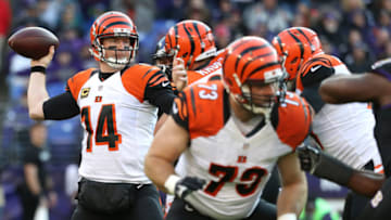 BALTIMORE, MD - NOVEMBER 27: Quarterback Andy Dalton #14 of the Cincinnati Bengals passes the ball while tackle Eric Winston #73 of the Cincinnati Bengals defends against the Baltimore Ravens in the third quarter at M&T Bank Stadium on November 27, 2016 in Baltimore, Maryland. (Photo by Rob Carr/Getty Images)