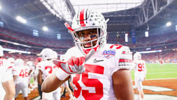 GLENDALE, AZ - DECEMBER 31: Chris Worley #35 of the Ohio State Buckeyes gestures prior to the start of the 2016 PlayStation Fiesta Bowl against the Clemson Tigers at University of Phoenix Stadium on December 31, 2016 in Glendale, Arizona. (Photo by Jamie Squire/Getty Images)