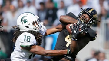EAST LANSING, MI - SEPTEMBER 09: Cornerback Darius Phillips #4 of the Western Michigan Broncos intercepts a pass intended for wide receiver Felton Davis III #18 of the Michigan State Spartans during the first quarter at Spartan Stadium on September 9, 2017 in East Lansing, Michigan. (Photo by Duane Burleson/Getty Images)