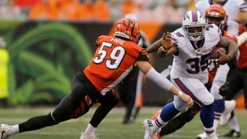 CINCINNATI, OH - OCTOBER 8: Nick Vigil #59 of the Cincinnati Bengals attempts to tackle Mike Tolbert #35 of the Buffalo Bills during the second quarter at Paul Brown Stadium on October 8, 2017 in Cincinnati, Ohio. (Photo by Michael Reaves/Getty Images)