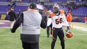 BALTIMORE, MD - DECEMBER 31: Head coach Marvin Lewis and defensive end Carl Lawson #58 of the Cincinnati Bengals celebrate after a 31-27 win over the Baltimore Ravens at M&T Bank Stadium on December 31, 2017 in Baltimore, Maryland. (Photo by Rob Carr/Getty Images)
