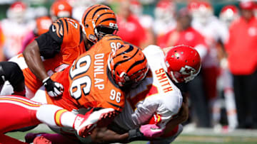 CINCINNATI, OH - OCTOBER 4: Carlos Dunlap #96 of the Cincinnati Bengals and Geno Atkins #97 of the Cincinnati Bengals combine to sack Alex Smith #11 of the Kansas City Chiefs during the third quarter at Paul Brown Stadium on October 4, 2015 in Cincinnati, Ohio. (Photo by Joe Robbins/Getty Images)