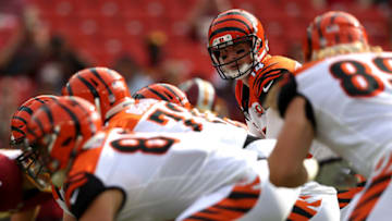 LANDOVER, MD - AUGUST 27: Quarterback Andy Dalton #14 of the Cincinnati Bengals looks on from the line of scrimmage against the Washington Redskins in the first half during a preseason game at FedExField on August 27, 2017 in Landover, Maryland. (Photo by Patrick Smith/Getty Images)