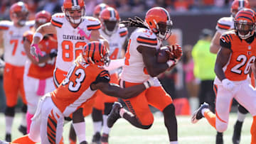 CINCINNATI, OH - OCTOBER 23: Isaiah Crowell #34 of the Cleveland Browns breaks a tackle by George Iloka #43 of the Cincinnati Bengals during the first quarter at Paul Brown Stadium on October 23, 2016 in Cincinnati, Ohio. (Photo by John Grieshop/Getty Images)