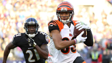 BALTIMORE, MD - NOVEMBER 27: Wide receiver Tyler Boyd #83 of the Cincinnati Bengals carries the ball past free safety Lardarius Webb #21 of the Baltimore Ravens in the third quarter at M&T Bank Stadium on November 27, 2016 in Baltimore, Maryland. (Photo by Patrick Smith/Getty Images)