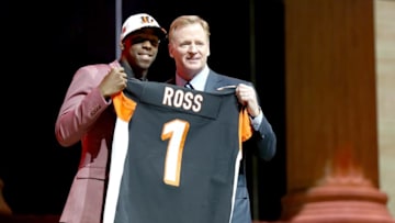 PHILADELPHIA, PA - APRIL 27: (L-R) John Ross of Washington poses with Commissioner of the National Football League Roger Goodell after being picked