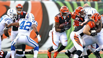 CINCINNATI, OH - AUGUST 28: Jeremy Hill #32 of the Cincinnati Bengals carries the ball against Marcus Burley #42 of the Indianapolis Colts during the first quarter at Paul Brown Stadium on August 28, 2014 in Cincinnati, Ohio. (Photo by John Grieshop/Getty Images)
