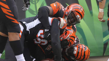 CINCINNATI, OH - OCTOBER 29: Carlos Dunlap #96, Vontaze Burfict #55 and Dre Kirkpatrick #27 of the Cincinnati Bengals celebrate a touchdown during the game against the Indianapolis Colts at Paul Brown Stadium on October 29, 2017 in Cincinnati, Ohio. The Bengals defeated the Colts 24-23. (Photo by John Grieshop/Getty Images)