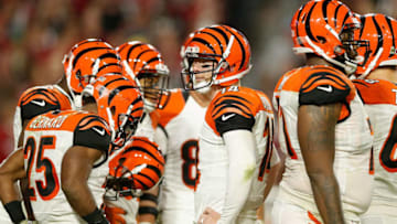 GLENDALE, AZ - NOVEMBER 22: Quarterback Andy Dalton #14 of the Cincinnati Bengals reacts in the huddle during the second half of the NFL game against the Arizona Cardinals at the University of Phoenix Stadium on November 22, 2015 in Glendale, Arizona. The Cardinals defeated the Bengals 34-31. (Photo by Christian Petersen/Getty Images)