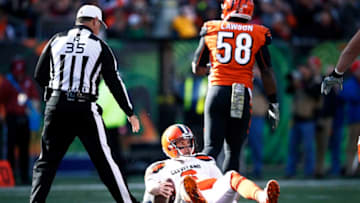 CINCINNATI, OH - NOVEMBER 26: Cody Kessler #6 of the Cleveland Browns reacts after being sacked by Carl Lawson #58 of the Cincinnati Bengals in the first half of a game at Paul Brown Stadium on November 26, 2017 in Cincinnati, Ohio. The Bengals won 30-16. (Photo by Joe Robbins/Getty Images)