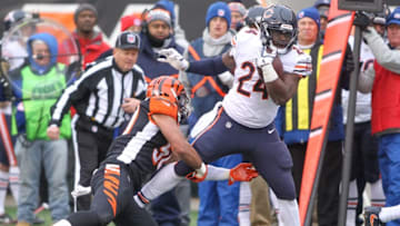 CINCINNATI, OH - DECEMBER 10: Jordan Howard #24 of the Chicago Bears breaks a tackle from Jordan Evans #50 of the Cincinnati Bengals during the first half at Paul Brown Stadium on December 10, 2017 in Cincinnati, Ohio. (Photo by John Grieshop/Getty Images)