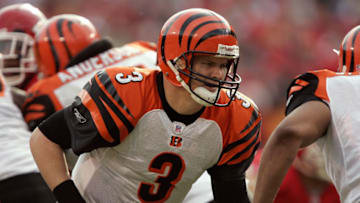 KANSAS CITY, MO - JANUARY 1: Quarterback Jon Kitna #3 of the Cincinnati Bengals hands off against the Kansas City Chiefs at Arrowhead Stadium on January 1, 2006 in Kansas City, Missouri. The Chiefs won 37-3. (Photo by Brian Bahr/Getty Images)
