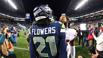 SEATTLE, WASHINGTON - DECEMBER 29: Tre Flowers #21 of the Seattle Seahawks and Richard Sherman #25 of the San Francisco 49ers chat after the game at CenturyLink Field on December 29, 2019 in Seattle, Washington. The San Francisco 49ers top the Seattle Seahawks 26-21. (Photo by Alika Jenner/Getty Images)