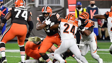 CLEVELAND, OH - SEPTEMBER 17: Nick Chubb #24 of the Cleveland Browns breaks through the tackle of Vonn Bell #24 of the Cincinnati Bengals for an 11-yard touchdown run in the first quarter at FirstEnergy Stadium on September 17, 2020 in Cleveland, Ohio. (Photo by Jamie Sabau/Getty Images)