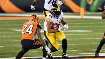 CINCINNATI, OH - DECEMBER 21: Benny Snell #24 of the Pittsburgh Steelers carries the ball against the Cincinnati Bengals at Paul Brown Stadium on December 21, 2020 in Cincinnati, Ohio. (Photo by Jamie Sabau/Getty Images)