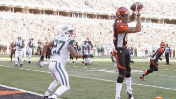 CINCINNATI, OH - OCTOBER 27: Marvin Jones #82 of the Cincinnati Bengals hauls in the touchdown pass during the game against the New York Jets at Paul Brown Stadium on October 27, 2013 in Cincinnati, Ohio. The Bengals defeated the Jets 49-9. (Photo by John Grieshop/Getty Images)