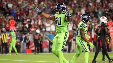 GLENDALE, AZ - NOVEMBER 09: Outside linebacker K.J. Wright #50 of the Seattle Seahawks celebrate a turnover on downs against in the second half of the NFL game against the Arizona Cardinals at University of Phoenix Stadium on November 9, 2017 in Glendale, Arizona. The Seattle Seahawks won 22-16. (Photo by Christian Petersen/Getty Images)