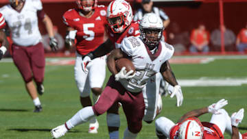 LINCOLN, NE - OCTOBER 27: Wide receiver Jimmie Robinson #22 of the Bethune Cookman Wildcats breaks a tackle against the Nebraska Cornhuskers in the first half at Memorial Stadium on October 27, 2018 in Lincoln, Nebraska. (Photo by Steven Branscombe/Getty Images)