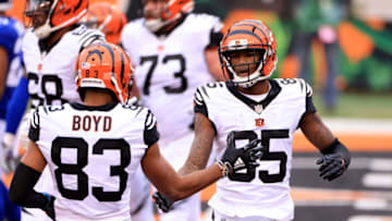 Tee Higgins #85 and Tyler Boyd #83 of the Cincinnati Bengals celebrate after a touchdown (Photo by Justin Casterline/Getty Images)