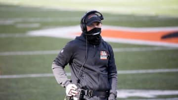 Cincinnati Bengals head coach Zac Taylor speaks into his headset in the second quarter of the NFL game between Cincinnati Bengals and Tennessee Titans on Sunday, Nov. 1, 2020, in Cincinnati.Cincinnati Bengals At Tennessee Titans