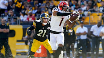 Cincinnati Bengals wide receiver Ja'Marr Chase (1) catches a pass as Pittsburgh Steelers cornerback Tre Norwood (21) defends in the fourth quarter during a Week 3 NFL football game, Sunday, Sept. 26, 2021, at Heinz Field in Pittsburgh.Cincinnati Bengals At Pittsburgh Steelers Sept 26