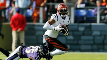 Cincinnati Bengals wide receiver Ja'Marr Chase (1) turns with a catch in the second quarter of the NFL Week 7 game between the Baltimore Ravens and the Cincinnati Bengals at M&T Bank Stadium in Baltimore on Sunday, Oct. 24, 2021. The Bengals led 13-10 at halftime.Cincinnati Bengals At Baltimore Ravens Week 7