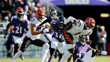Cincinnati Bengals wide receiver Ja'Marr Chase (1) breaks tackles as he takes a reception 82 yards for a touchdown in the third quarter of the NFL Week 7 game between the Baltimore Ravens and the Cincinnati Bengals at M&T Bank Stadium in Baltimore on Sunday, Oct. 24, 2021. The Bengals moved into the top of the AFC North with a 41-17 win over the Ravens.Cincinnati Bengals At Baltimore Ravens Week 7