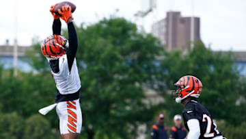 Cincinnati Bengals wide receiver Ja'Marr Chase (1) catches a pass as Cincinnati Bengals cornerback Eli Apple (20) - Mandatory Credit: Kareem Elgazzar-USA TODAY Sports