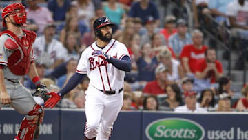 Jul 4, 2015; Atlanta, GA, USA; Atlanta Braves right fielder Nick Markakis (22) hits a RBI double against the Philadelphia Phillies in the fourth inning at Turner Field. Mandatory Credit: Brett Davis-USA TODAY Sports