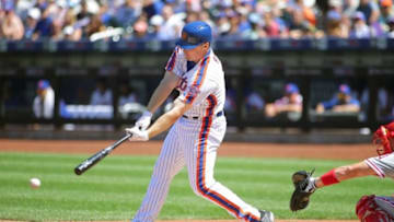 Aug 28, 2016; New York City, NY, USA; New York Mets right fielder Jay Bruce (19) singles against the Philadelphia Phillies during the first inning at Citi Field. Mandatory Credit: Andy Marlin-USA TODAY Sports