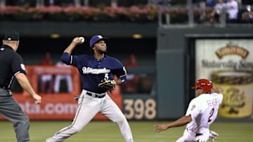 Jul 1, 2015; Philadelphia, PA, USA; Milwaukee Brewers second baseman Hector Gomez (5) gets the force out on Philadelphia Phillies left fielder Ben Revere (2) during the ninth inning at Citizens Bank Park. The Brewers defeated the Phillies, 9-5. Mandatory Credit: Eric Hartline-USA TODAY Sports