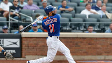 NEW YORK, NY - JULY 25: Jose Bautista #11 of the New York Mets follows through on his sixth inning two run home run against the San Diego Padres at Citi Field on July 25, 2018 in the Flushing neighborhood of the Queens borough of New York City. (Photo by Jim McIsaac/Getty Images)