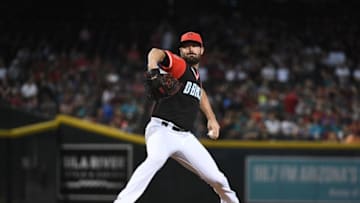 PHOENIX, AZ - AUGUST 25: Robbie Ray #38 of the Arizona Diamondbacks delivers a first inning pitch against the Seattle Mariners at Chase Field on August 25, 2018 in Phoenix, Arizona. All players across MLB will wear nicknames on their backs as well as colorful, non-traditional uniforms featuring alternate designs inspired by youth-league uniforms during Players Weekend. (Photo by Norm Hall/Getty Images)