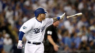 LOS ANGELES, CA - OCTOBER 26: Manny Machado #8 of the Los Angeles Dodgers hits a sixth inning single off the wall against the Boston Red Sox in Game Three of the 2018 World Series at Dodger Stadium on October 26, 2018 in Los Angeles, California. (Photo by Ezra Shaw/Getty Images)