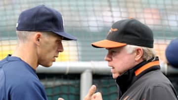 BALTIMORE, MD - MAY 18: Manager Joe Girardi #28 of the New York Yankees talks with Manager Buck Showalter #26 of the Baltimore Orioles before the game at Oriole Park at Camden Yards on May 18, 2011 in Baltimore, Maryland. (Photo by Greg Fiume/Getty Images)