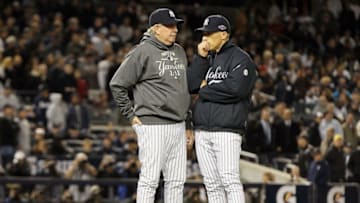 NEW YORK, NY - OCTOBER 11: (NEW YORK DAILIES OUT) Manager Joe Girardi (R) and pitching coach Larry Rothschild during Game Four of the American League Division Series against the Baltimore Orioles at Yankee Stadium on October 11, 2012 in the Bronx borough of New York City. The Orioles defeated the Yankees 2-1 in 13 innings. (Photo by Jim McIsaac/Getty Images)