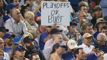 TORONTO, CANADA - JULY 28: A Toronto Blue Jays fan holds a sign about the teamâs drive to the playoffs during MLB game action against the Philadelphia Phillies on July 28, 2015 at Rogers Centre in Toronto, Ontario, Canada. (Photo by Tom Szczerbowski/Getty Images)