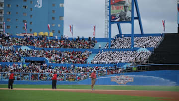 HAVANA, CUBA - MARCH 22: Grounds keepers prepare the field at the Estadio Latinoamericano before an exposition baseball game between the Cuban national baseball team and the Major League Baseball team Tampa Bay Devil Rays at the Estado Latinoamericano March 22, 2016 in Havana, Cuba. Cuban President Raul Castro and U.S. President Barack Obama attended the game, the first time a sittng president has visited Cuba in 88 years. (Photo by Chip Somodevilla/Getty Images)