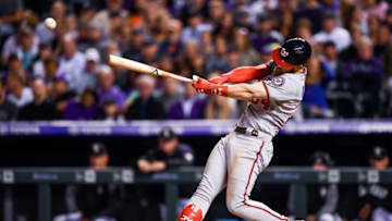 DENVER, CO - SEPTEMBER 29: Bryce Harper #34 of the Washington Nationals hits a seventh inning single against the Colorado Rockies at Coors Field on September 29, 2018 in Denver, Colorado. (Photo by Dustin Bradford/Getty Images)