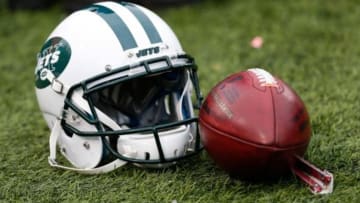 Jan 3, 2016; Orchard Park, NY, USA; A general view of a New York Jets helmet and an NFL football during the game between the Buffalo Bills and the New York Jets at Ralph Wilson Stadium. Mandatory Credit: Kevin Hoffman-USA TODAY Sports