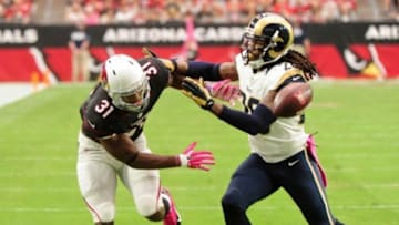 Oct 4, 2015; Glendale, AZ, USA; St. Louis Rams strong safety Mark Barron (26) breaks up a pass intended for Arizona Cardinals running back David Johnson (31) during the first half at University of Phoenix Stadium. Mandatory Credit: Matt Kartozian-USA TODAY Sports