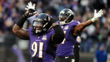 Nov 22, 2015; Baltimore, MD, USA; Baltimore Ravens linebacker Courtney Upshaw (91) celebrates in the fourth quarter against the St. Louis Rams at M&T Bank Stadium. Mandatory Credit: Evan Habeeb-USA TODAY Sports