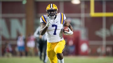 Nov 12, 2016; Fayetteville, AR, USA; LSU Tigers running back Leonard Fournette (7) runs during the first quarter of the game against the Arkansas Razorbacks at Donald W. Reynolds Razorback Stadium. Mandatory Credit: Brett Rojo-USA TODAY Sports