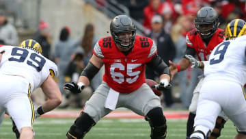 Nov 26, 2016; Columbus, OH, USA; Ohio State Buckeyes offensive lineman Pat Elflein (65) blocks during the second quarter against the Michigan Wolverines at Ohio Stadium. Ohio State won 30-27. Mandatory Credit: Joe Maiorana-USA TODAY Sports