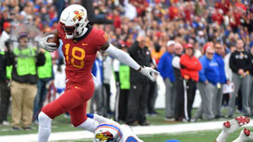 LAWRENCE, KS - NOVERMBER 3: Wide receiver Hakeem Butler #18 of the Iowa State Cyclones slips past cornerback Hasan Defense #13 of the Kansas Jayhawks as goes for a 51-yard touchdown pass in the first quarter at Memorial Stadium on November 3, 2018 in Lawrence, Kansas. (Photo by Ed Zurga/Getty Images)
