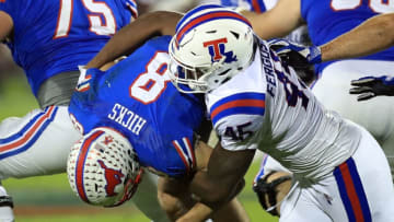 FRISCO, TX - DECEMBER 20: Jaylon Ferguson #45 of the Louisiana Tech Bulldogs sacks Ben Hicks #8 of the Southern Methodist Mustangs in the third quarter during the 2017 DXL Frisco Bowl on December 20, 2017 in Frisco, Texas. (Photo by Ronald Martinez/Getty Images)