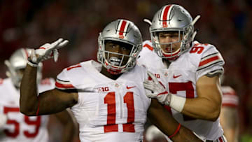 MADISON, WI - OCTOBER 15: Jalyn Holmes #11 and Nick Bosa #97 of the Ohio State Buckeyes celebrate after Holmes recorded a sack in the third quarter against the Wisconsin Badgers at Camp Randall Stadium on October 15, 2016 in Madison, Wisconsin. (Photo by Dylan Buell/Getty Images)