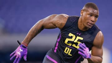 INDIANAPOLIS, IN - MARCH 04: Kansas defensive lineman Dorance Armstrong (DL25) runs a drill during the NFL Scouting Combine at Lucas Oil Stadium on March 4, 2018 in Indianapolis, Indiana. (Photo by Michael Hickey/Getty Images)