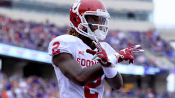 FORT WORTH, TX - OCTOBER 20: CeeDee Lamb #2 of the Oklahoma Sooners celebrates after scoring a touchdown against the TCU Horned Frogs in the first half at Amon G. Carter Stadium on October 20, 2018 in Fort Worth, Texas. (Photo by Tom Pennington/Getty Images)